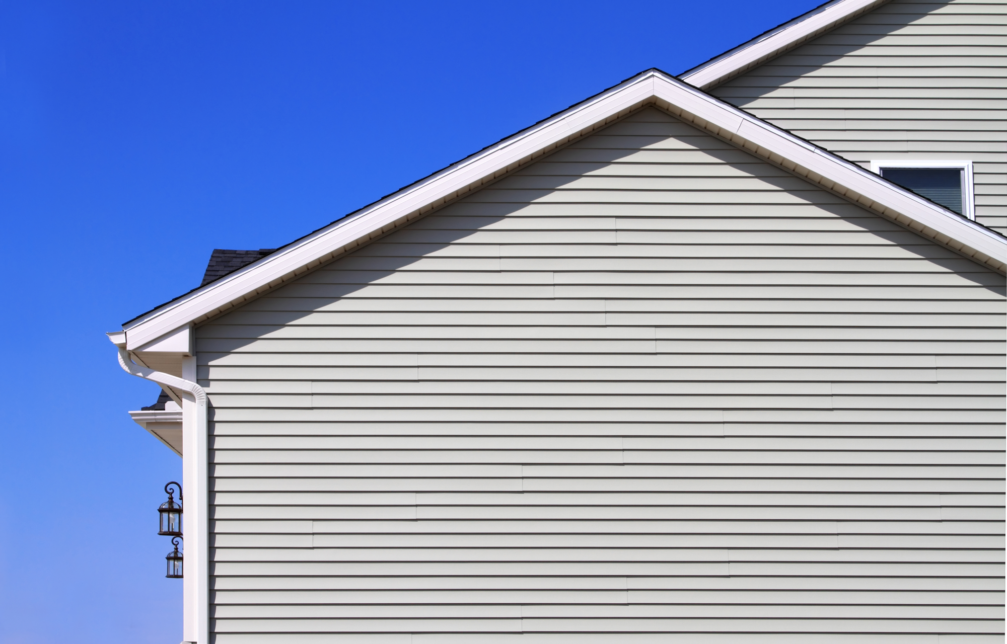 Side of house with tan siding